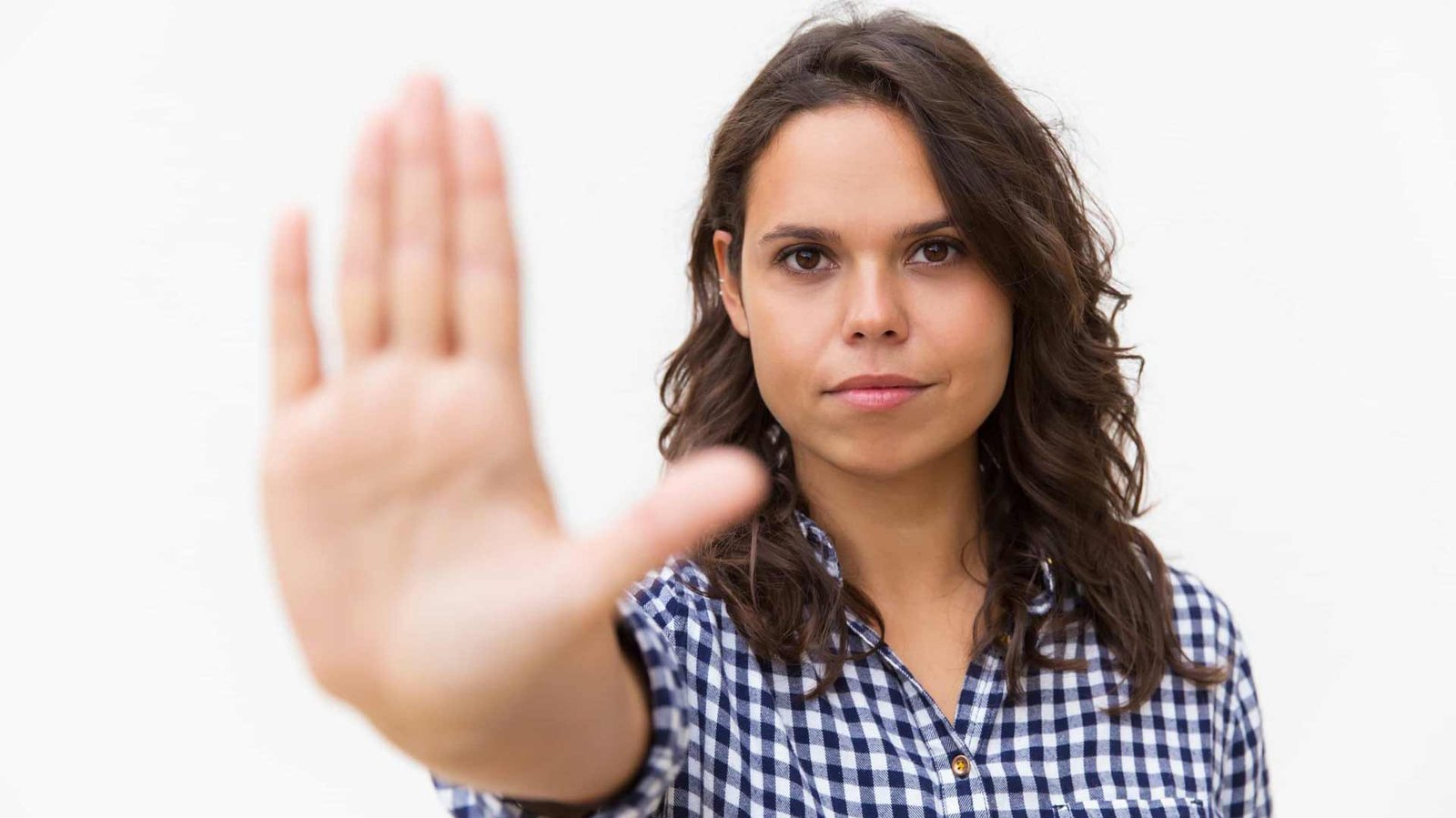 woman with hand up